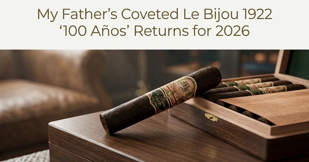 A premium My Father Le Bijou 1922 100 Años cigar resting on a wooden surface.