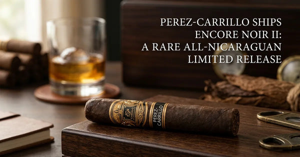 A premium Perez-Carrillo Encore Noir II cigar resting on a dark wood surface with elegant lighting.