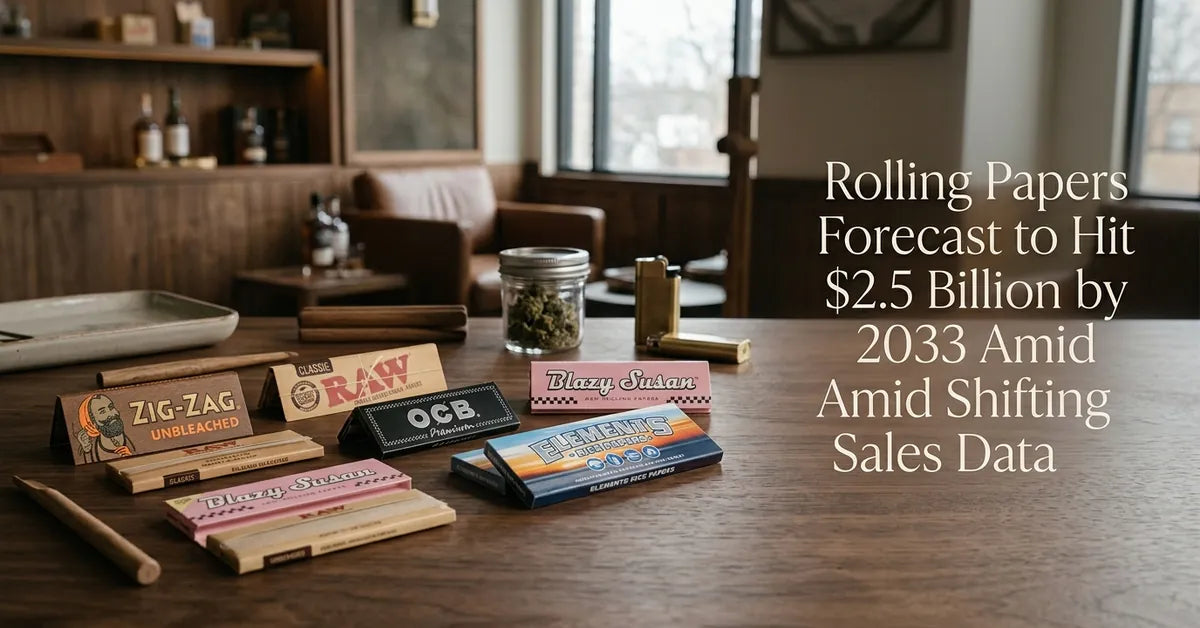 A collection of premium rolling paper booklets and hemp wraps displayed on a wooden table.