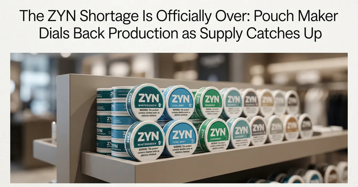 Stacked cans of ZYN nicotine pouches on a well-stocked retail shelf.