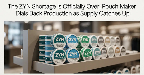 Stacked cans of ZYN nicotine pouches on a well-stocked retail shelf.