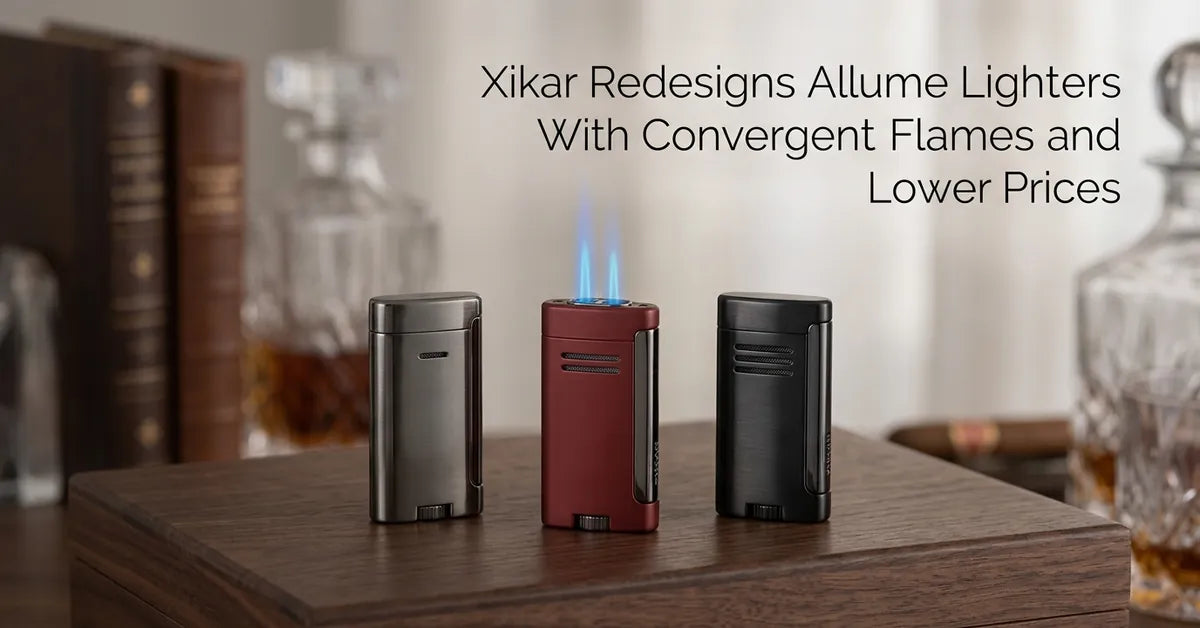 Three redesigned Xikar Allume torch lighters displayed on a wooden surface, one showing a blue convergent flame.