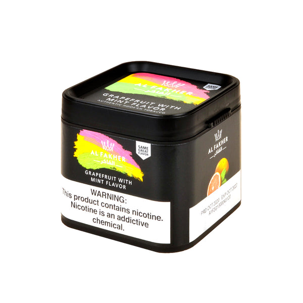 Close-up of Al Fakher Grapefruit With Mint shisha tobacco molasses showing texture and cut