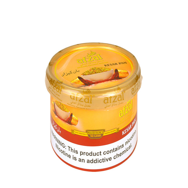 Close-up of Afzal Kesar Pan Shisha Molasses showing texture and golden saffron infusion