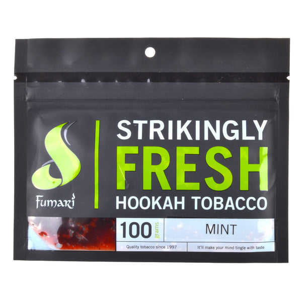 Close-up of Fumari Mint blonde leaf shisha tobacco texture and honey-infused cut