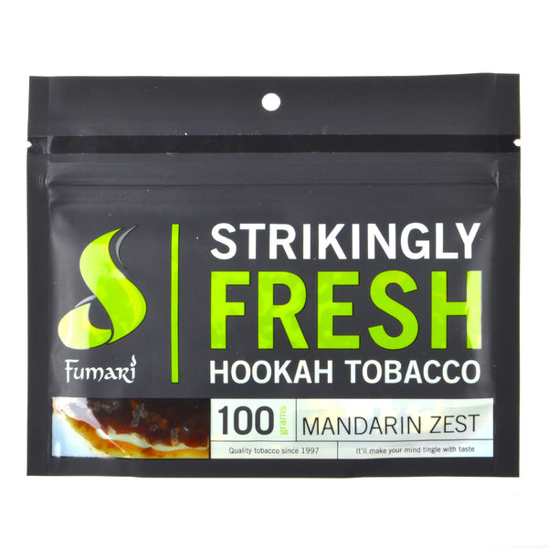 Close-up of Fumari Mandarin Zest Shisha 100g bag showing citrus flavor branding